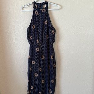Versona jumpsuit navy blue with sunflowers size 10